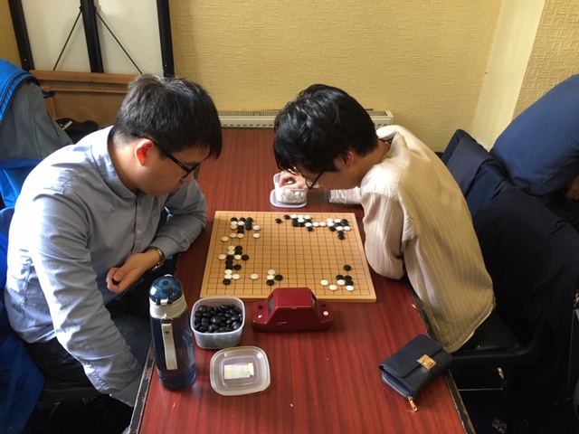 The decisive third round game between Yishen Wang and Tunyang Xie